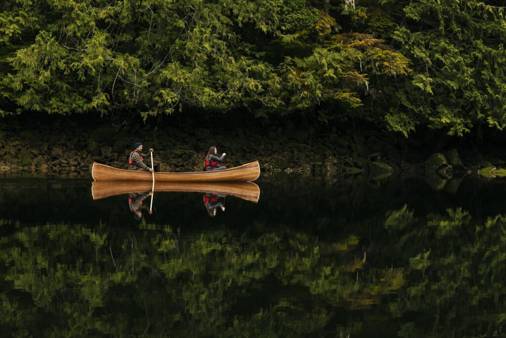Man and woman Paddling a Canoe